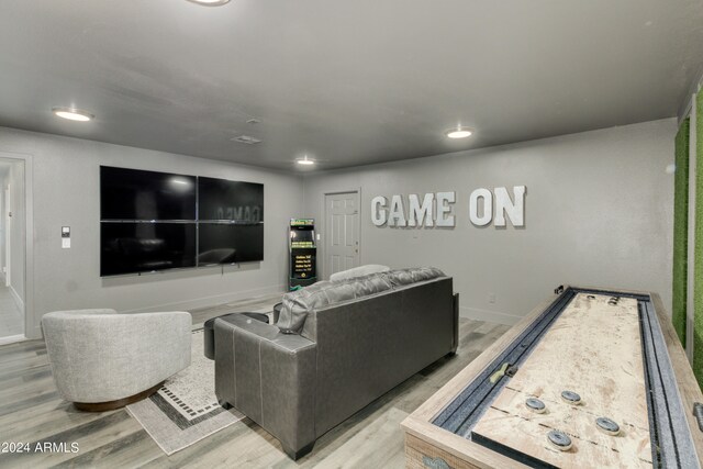 living room with light hardwood / wood-style flooring