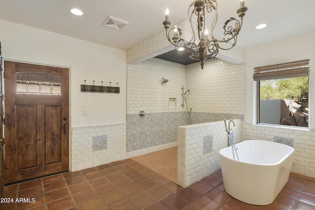 bathroom with separate shower and tub, tile patterned flooring, tile walls, and a notable chandelier