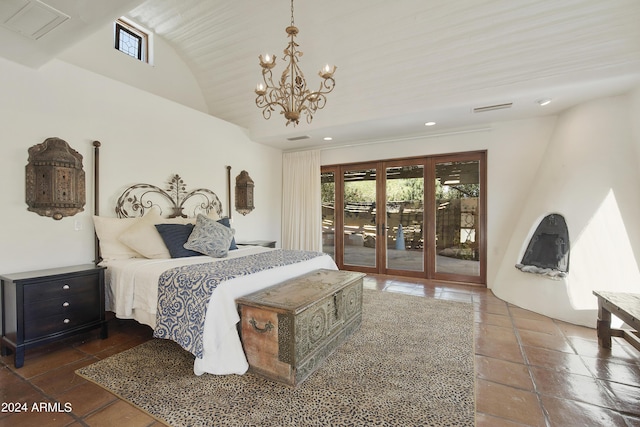 bedroom with an inviting chandelier, lofted ceiling, and access to outside