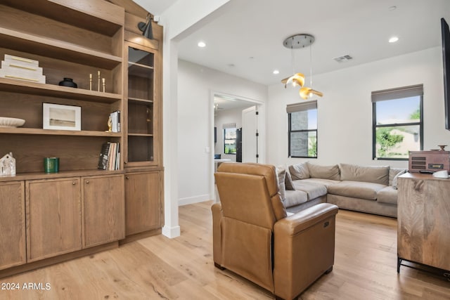 living room with light hardwood / wood-style floors