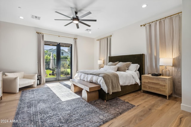 bedroom featuring french doors, access to exterior, ceiling fan, and light hardwood / wood-style floors