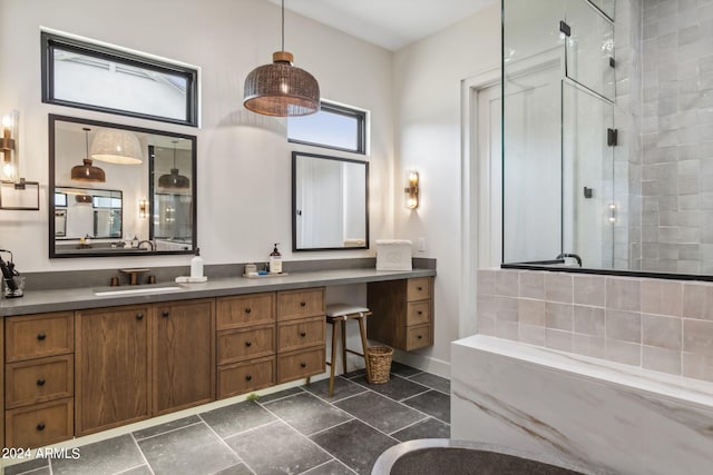 bathroom with an enclosed shower and vanity