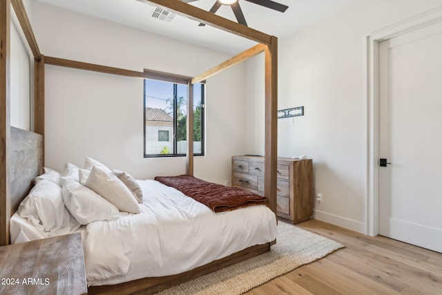 bedroom featuring ceiling fan and light wood-type flooring