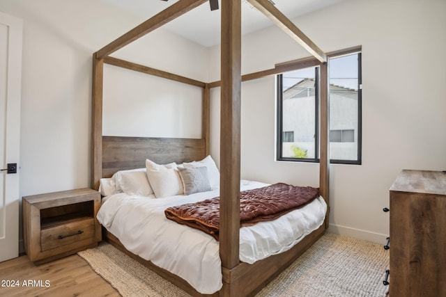 bedroom with light hardwood / wood-style flooring