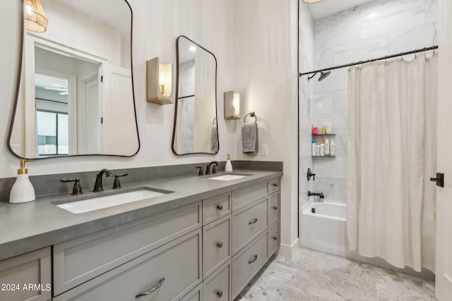 bathroom with shower / bathtub combination with curtain and vanity