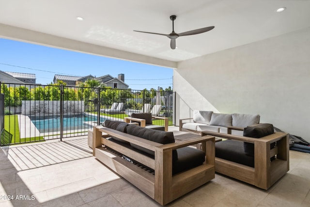 view of patio featuring an outdoor hangout area, ceiling fan, and a fenced in pool