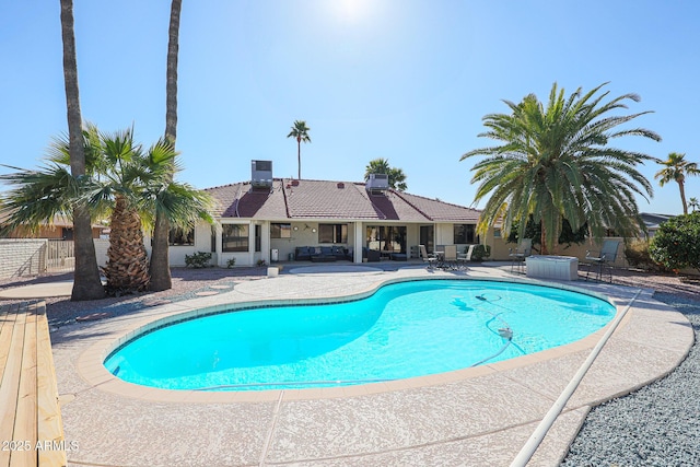 view of swimming pool featuring central AC and a patio area