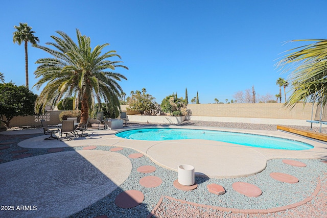 view of swimming pool featuring a patio