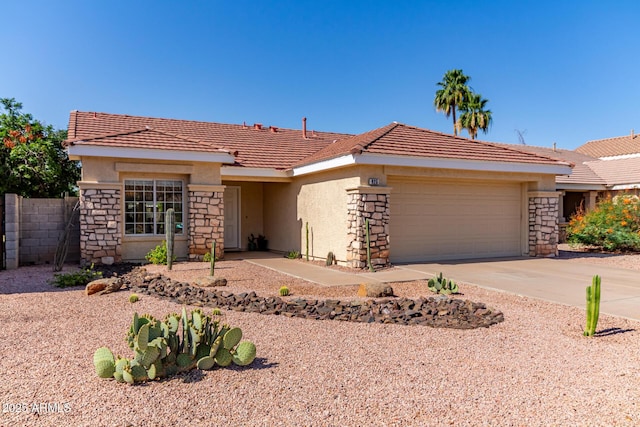 925 W Hudson Way, Gilbert, AZ 85233 - single story home featuring stucco siding, an attached garage, stone siding, and driveway