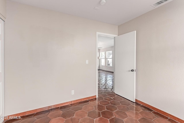 925 W Hudson Way, Gilbert, AZ 85233 - unfurnished room with baseboards and a smoke detector