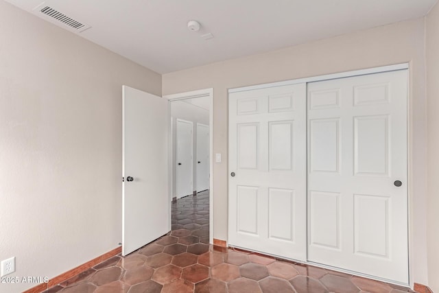 925 W Hudson Way, Gilbert, AZ 85233 - unfurnished bedroom with baseboards and a closet