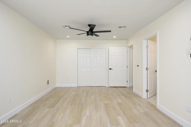 unfurnished bedroom featuring a closet, ceiling fan, and light hardwood / wood-style floors