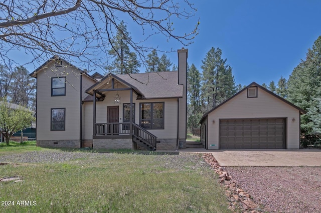 view of front of property with a front lawn and a garage