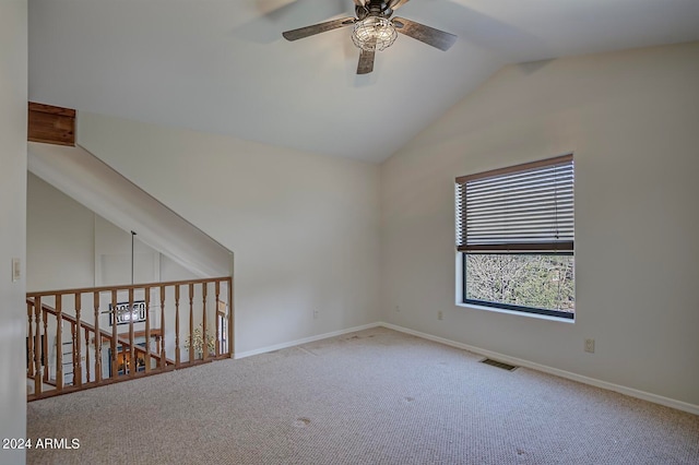 unfurnished room with carpet flooring, ceiling fan, and lofted ceiling