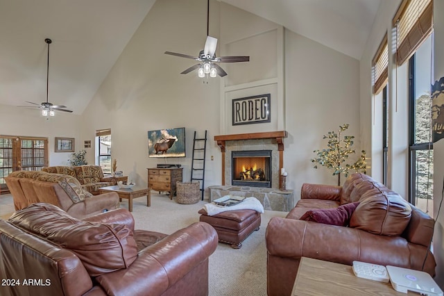 living room featuring carpet flooring, ceiling fan, and high vaulted ceiling