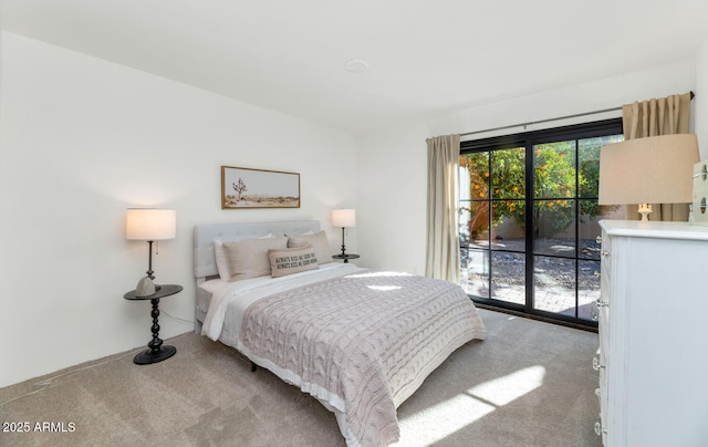 bedroom featuring light colored carpet