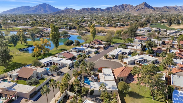 bird's eye view featuring a water and mountain view