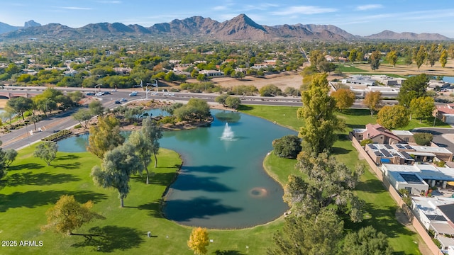 bird's eye view with a water and mountain view