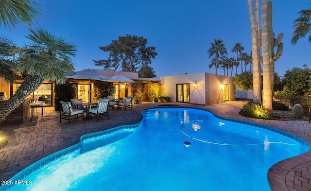 view of pool with a patio area