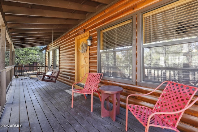 deck with covered porch