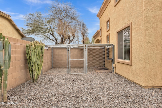 view of yard with an outdoor structure and fence