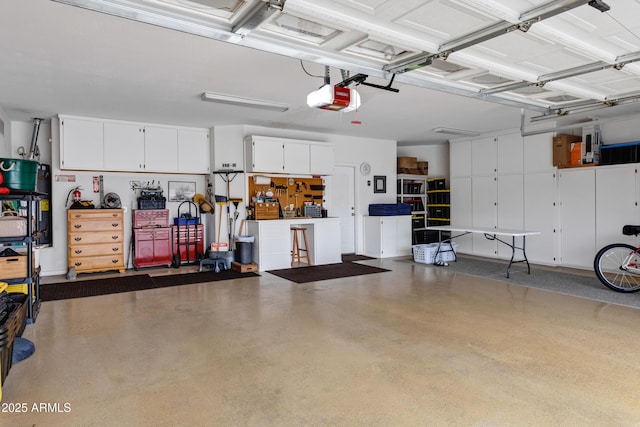 garage featuring a garage door opener