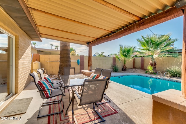 view of pool featuring a patio area