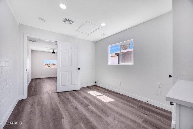 119 W Silver Reef Rd, Casa Grande, AZ 85122 - unfurnished bedroom featuring wood finished floors, baseboards, and recessed lighting