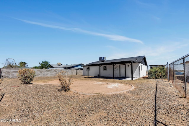 119 W Silver Reef Rd, Casa Grande, AZ 85122 - back of property with a fenced backyard and a patio