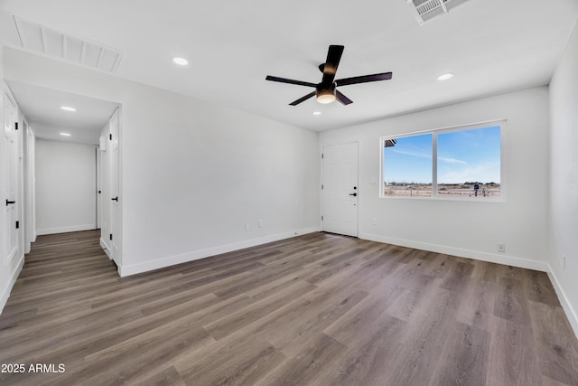 119 W Silver Reef Rd, Casa Grande, AZ 85122 - empty room featuring ceiling fan, wood finished floors, baseboards, and recessed lighting