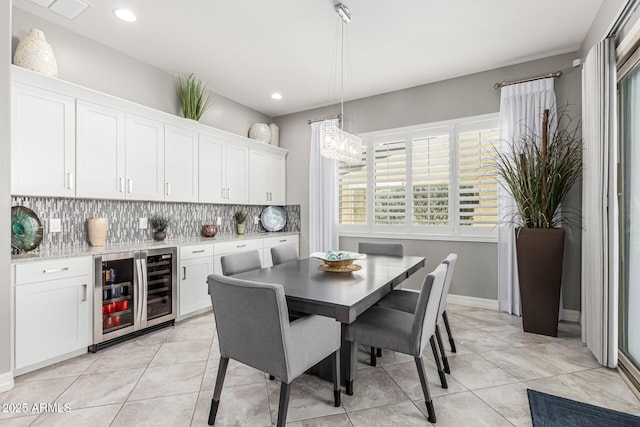 dining area featuring light tile patterned flooring, beverage cooler, visible vents, and recessed lighting
