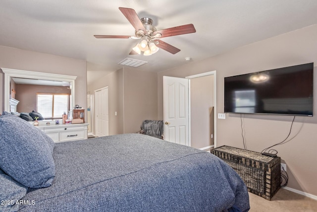 bedroom featuring visible vents, carpet flooring, a ceiling fan, and baseboards