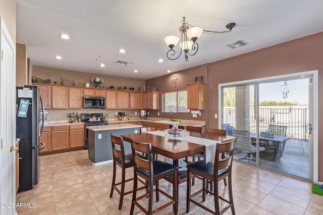 dining space featuring recessed lighting, visible vents, a notable chandelier, and light tile patterned floors