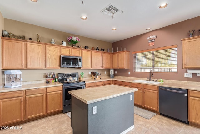kitchen featuring visible vents, range with electric cooktop, a sink, stainless steel microwave, and dishwashing machine