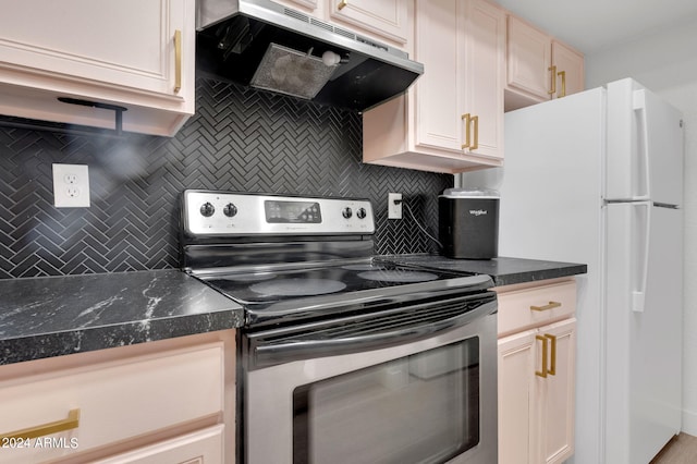 kitchen with exhaust hood, backsplash, white refrigerator, and stainless steel electric range oven