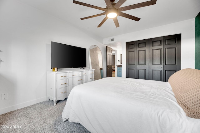 carpeted bedroom with ceiling fan