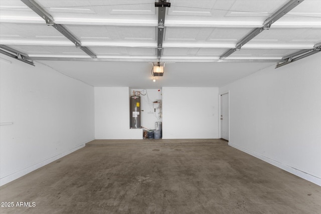 garage featuring electric water heater and a garage door opener