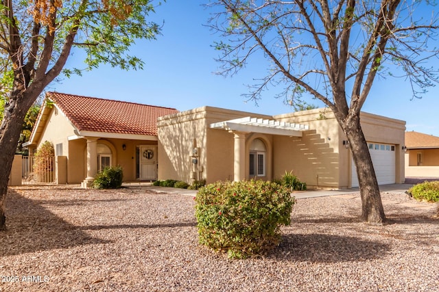 view of front of home with a garage