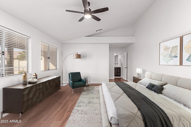 bedroom with ceiling fan, lofted ceiling, and dark hardwood / wood-style floors