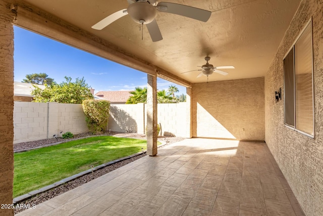 view of patio with ceiling fan