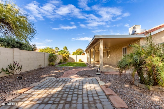 view of patio / terrace with cooling unit and ceiling fan