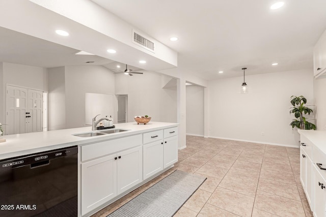 kitchen with decorative light fixtures, black dishwasher, sink, and white cabinets