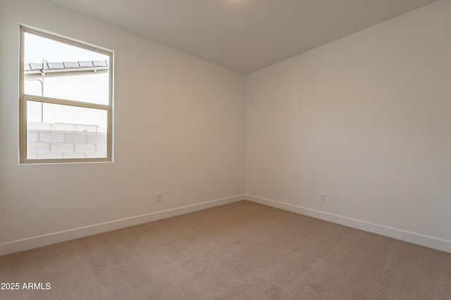 empty room featuring carpet floors