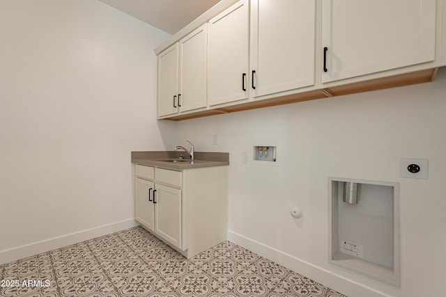 washroom with cabinets, sink, washer hookup, hookup for an electric dryer, and light tile patterned flooring