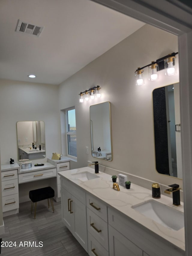 38422 W Buckeye Rd, Tonopah, AZ 85354 - full bath with visible vents, recessed lighting, double vanity, and a sink