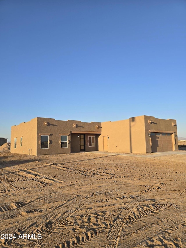 38422 W Buckeye Rd, Tonopah, AZ 85354 - rear view of property with stucco siding