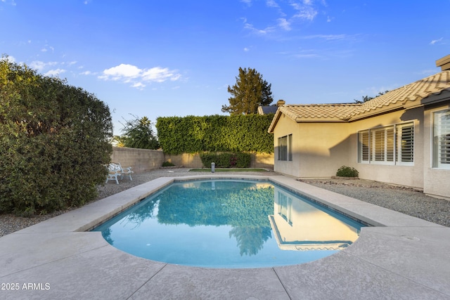 view of pool with a fenced backyard and a fenced in pool