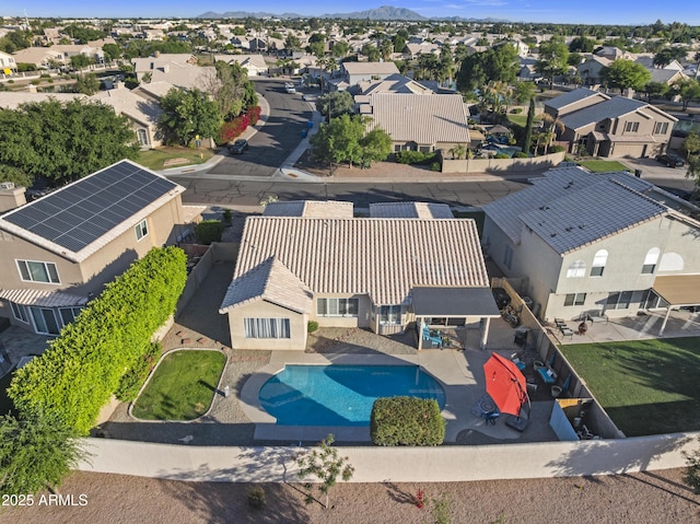 drone / aerial view with a residential view and a mountain view