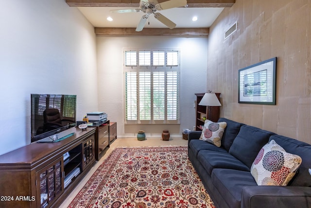 living area with visible vents and a ceiling fan