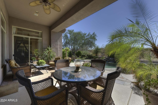 view of patio / terrace featuring a ceiling fan and an outdoor living space